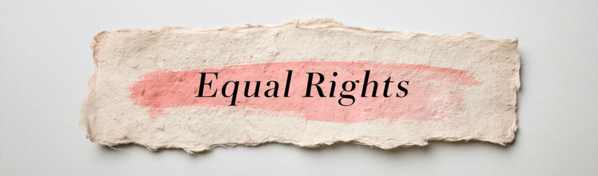 Equality's Declaration: A torn piece of paper with handwritten text Equal Rights and a soft pink brushstroke, symbolizing a call for fairness and justice.