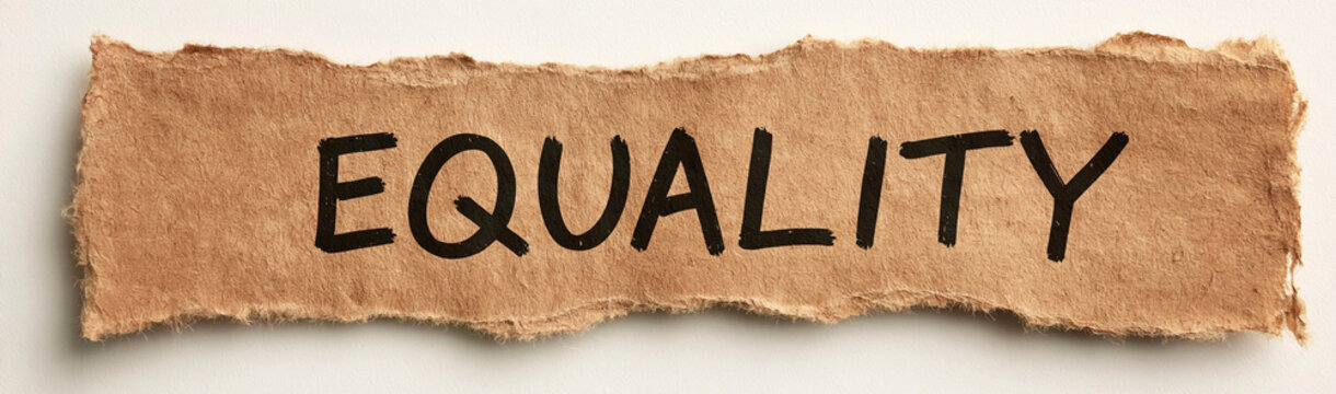 Equality Written on Torn Paper: A simple yet powerful message, the word EQUALITY is boldly written in black ink on a piece of torn, textured brown paper.