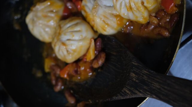 Bean and vegetable ragout paired with steamed dumplings&nbsp;&mdash;&nbsp;a bold twist on traditional flavors. Recipe combines a rich, ragout of beans, vegetables, dumplings, offering a unique fusion 