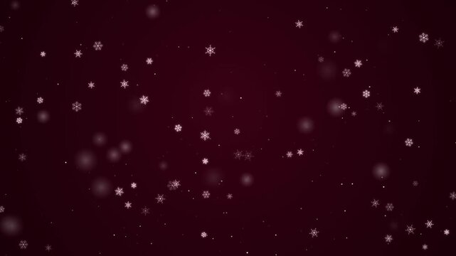 Snowflakes falling on a dark maroon background for winter holiday design