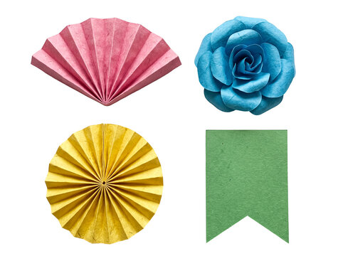 Colorful paper crafts: pink pleated fan, blue paper rose, yellow circular fan, and a green flag banner, isolated.