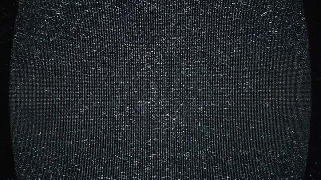 Close up of TV static noise pattern on screen digital interference background