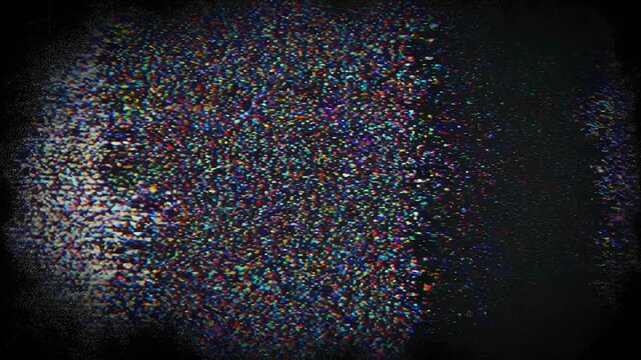Colorful digital noise glitch effect on black background with vibrant pixel distortion and static interference