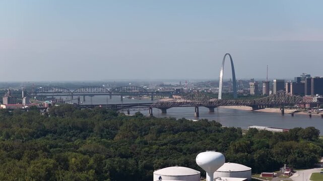 Aerial of Gateway arch and bridge on Mississippi River in Fairmont City Illinois on Missouri border with downtown St Louis
