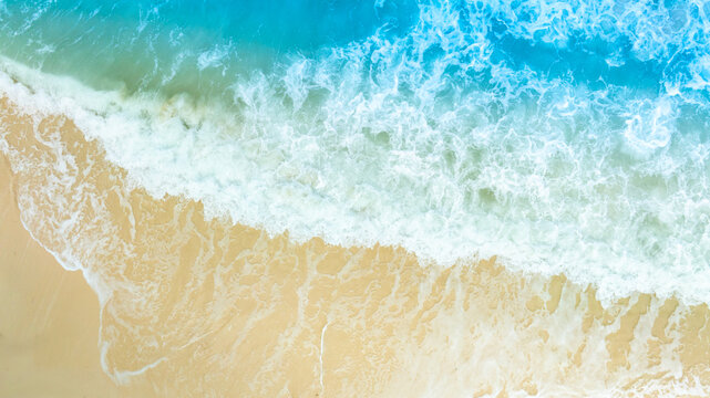 Nature of the ocean and blue sky Summer with sunshine, sandy beaches, clear blue waters sparkling against the blue sky. on an island with good ecology and environment Background for summer vacation