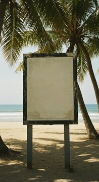 Blank Beach Signboard Under Palm Trees with Ocean View