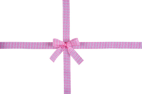 Pink and white gingham patterned crossing gift ribbon with neat central bow isolated on transparent background