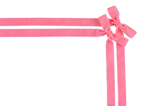 Top right corner border of double pink velvet intersecting ribbons and bows isolated on transparent background