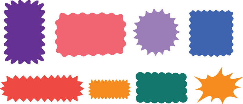 Collection of colorful decorative ribbons and labels with jagged edges in various shapes and sizes on a white background