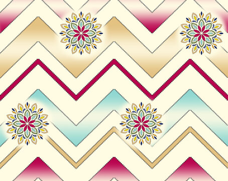 Seamless pattern featuring stepped chevron zigzags in magenta, teal, and gold paired with colorful floral mandala motifs over a cream background with soft gradient accents.