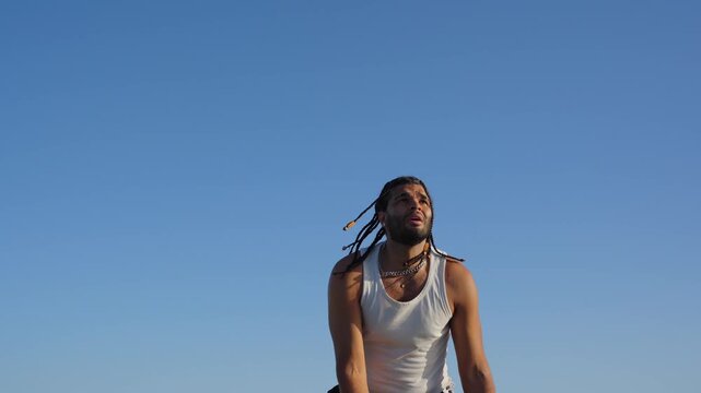 Streetball player dribbling basketball on outdoor court