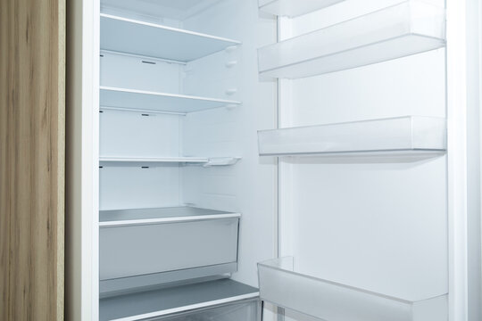 Refrigerator displays neat shelves and compartments for efficient food organization