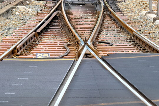 Railway tracks diverging at a junction, changing direction
