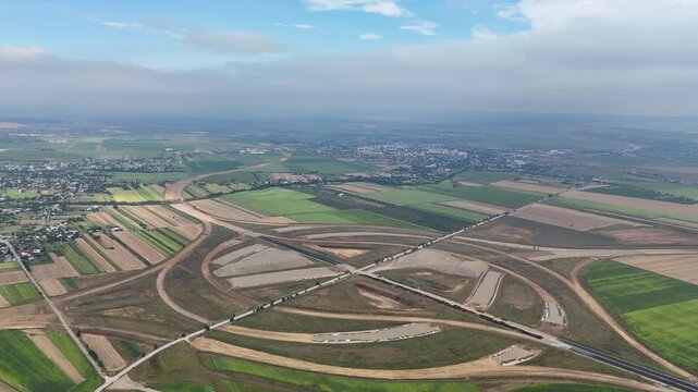 Aerial drone footage showing the large-scale road interchange near Pașcani, Romania, planned to connect the A7 and A8 motorway corridors in Romania