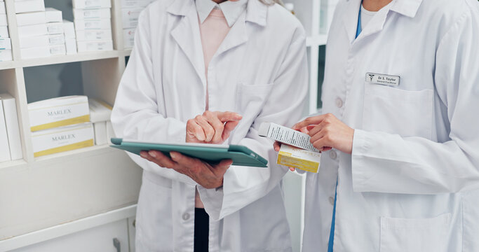 Chemist, people and hands in pharmacy with tablet, check medicine or verify with online prescription. Pharmacist, team and review drugs in dispensary with tech, medical research and collaboration