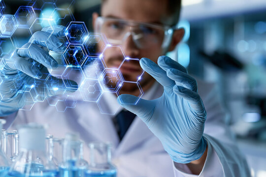 Scientist holds glowing molecular structure in lab. Hands gesture toward intricate hexagon patterns. Blue gloves and safety glasses complete lab attire. Background shows glassware, blurred equipment