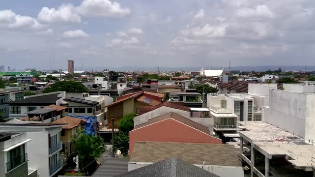 Wide Boom-Up Shot of Houses and Landscape of Taguig in Metro Manila Philippines