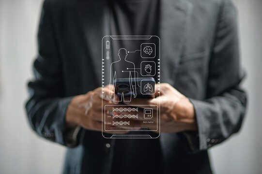Businessman In Suit Using Futuristic Transparent Screen With Healthcare Icons