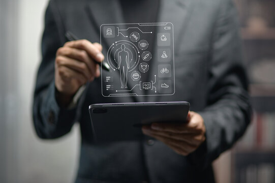 Businessman Interacting With Digital Human Body Health Data Displayed on Transparent Screen