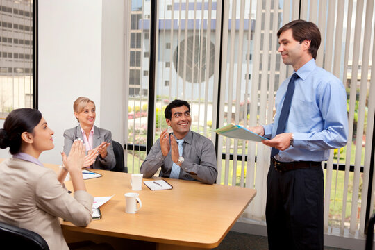 Executive getting an applause