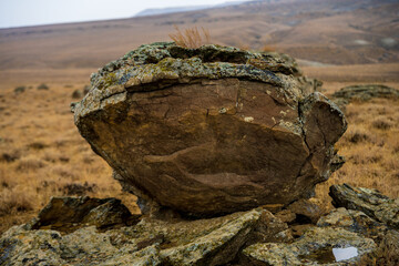 Large weathered rock in the Mangystau District landscape © Emad Aljumah