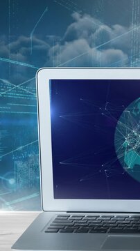 Animation of data processing with globe on computer screen over clouds