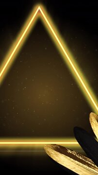Swinging black and gold christmas baubles and stars over gold leaves and triangle on black
