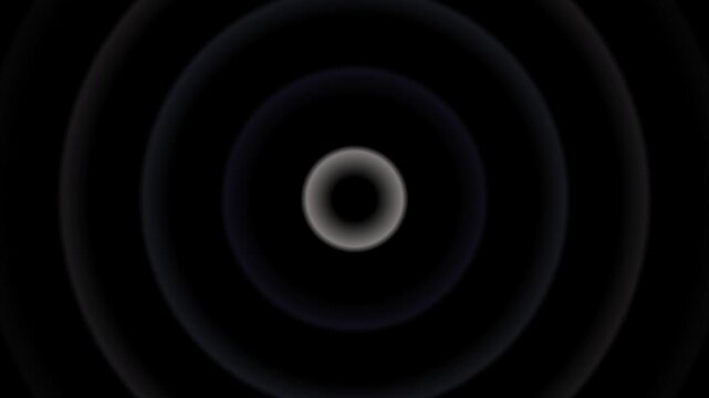 Seamless looping background of concentric dark circles with a subtle purple center