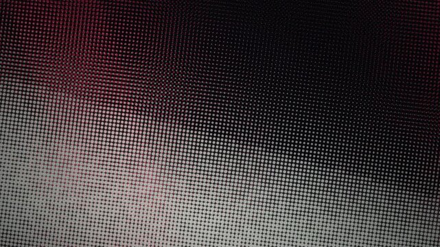 Abstract digital halftone pattern with red and gray gradient creating a seamless looping tech background