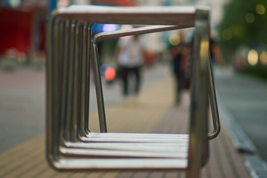 Modern Stainless Steel Bicycle Rack Framing City Alley Perspective