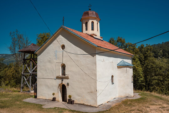 Exterior view of the Orthodox Monastery of Saint Onuphrius with a wooden bell tower near Bigar waterfall and Kalna village at Stara Planina nature reserve in Serbia. 13.08.2026
