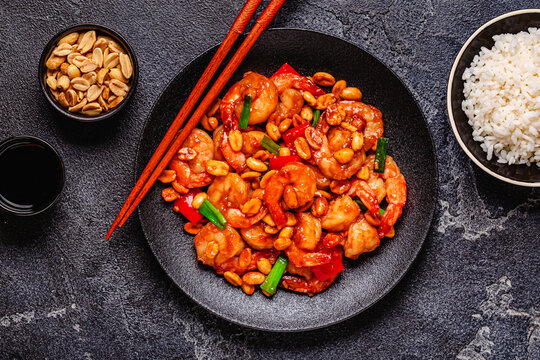 Kung pao shrimp, stir-fried shrimp with peanuts and vegetables