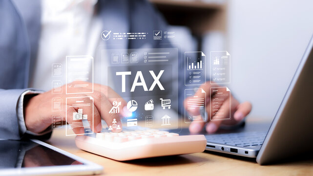Tax planning and financial management concept showing a business person reviewing tax documents, digital financial