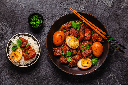 Braised pork belly and eggs. Traditional Southeast Asian cuisine