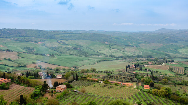 Beautiful landscape view of rolling hills and vineyards in Tuscany
