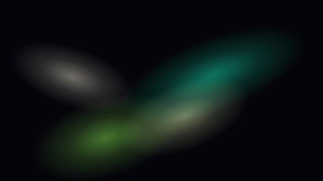 Glowing blurred elliptical shapes floating against a dark background in a seamless looping motion