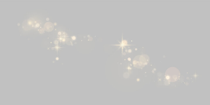 Curved trail of soft glowing gold bokeh lights and starbursts on a black background on transparent background
