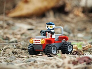 Naklejka premium Indonesia - July 24, 2023 : Mini toy at outdoor with blurred background.