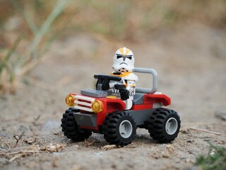 Naklejka premium Indonesia - August 15, 2023 : Mini toy at outdoor with blurred background.