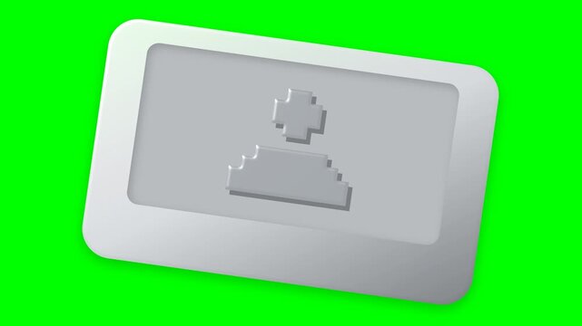 An animation shows a 3D-style grey user interface button featuring a pixel art cross icon rotating slowly with a perspective effect against a green screen background