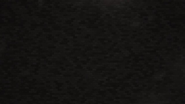 Dark textured surface with seamless looping pattern as a tech background