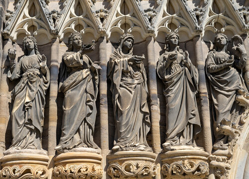 Detailed View of Virgin Mary Statues on a Historic Cathedral