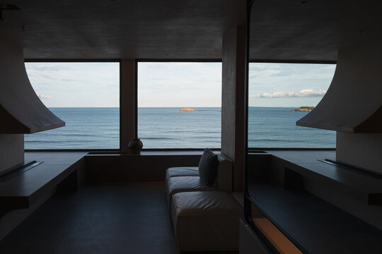 Interior Space with Floor-to-Ceiling Windows and Ocean Views