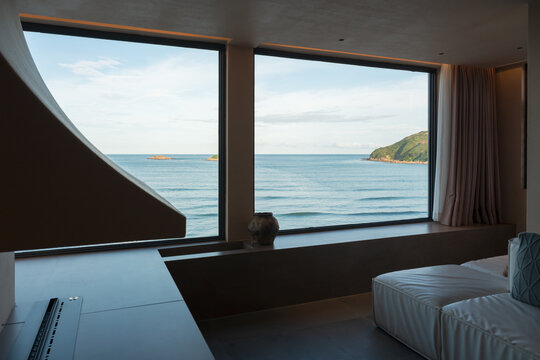Interior Space with Floor-to-Ceiling Windows and Ocean Views