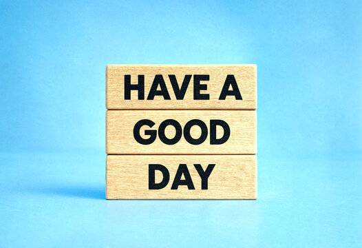 Wooden blocks with have a good day text stacked neatly for motivation and positivity message