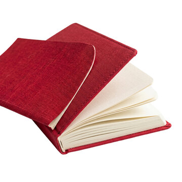Open red hardcover book with blank pages isolated.