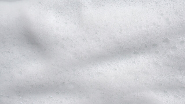 Closeup abstract white soap foam bubbles texture background