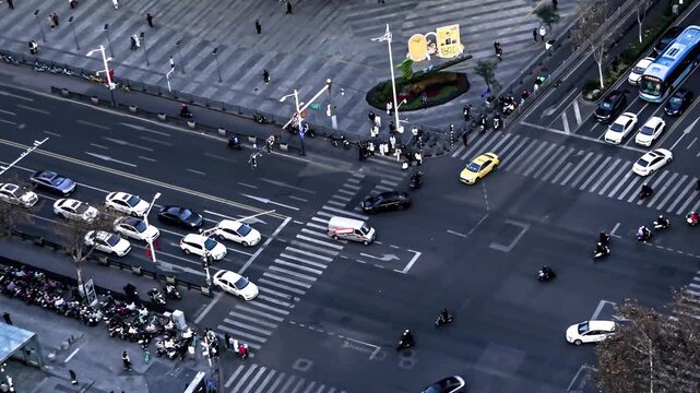 Busy City Intersection with Traffic and Pedestrians