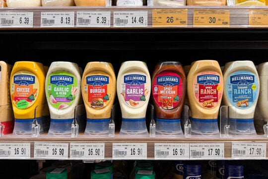 PENANG, MALAYSIA - AUG 18, 2026: Hellmann's mayonnaise and ranch sauces displayed on supermarket shelf.