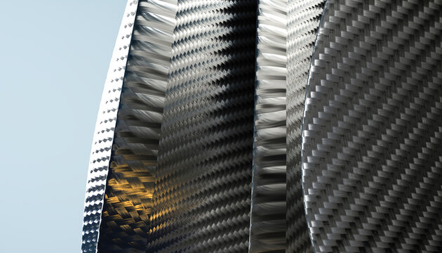 Close-up of curved carbon fiber sheets with reflective weave texture